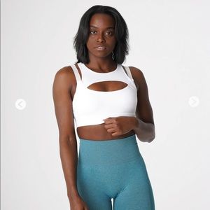 NVGTN sports bra size medium. New with tags in bag